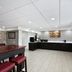 Red Roof PLUS+ Nashville South - Fairgrounds lobby with check-in counter and seating
