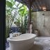 Villa Canggu by Plataran in North Kuta: open-air bathroom with soaking tub, shower and double sinks