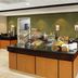 Fairfield Inn & Suites by Marriott Paducah breakfast area with buffet counter, fruit, and beverage station