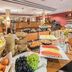 Breakfast buffet at Best Western Plus Kurhotel an der Obermaintherme in Bad Staffelstein with fruit, pastries and juices