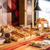 Breakfast buffet at ibis Cannes Mouans-Sartoux in Mouans-Sartoux with pastries, fruit and cereal dispensers
