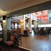Premier Inn Leicester North West in Leicester: warm hotel restaurant with dining tables, chairs, and wood flooring