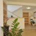 Appartement Sonnengarten in Ramsau am Dachstein lobby with wood reception desk and potted plants