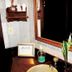 Maratea Mare in Florianopolis bathroom vanity with mirror, towel ring, sink, and potted plant