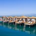 Titanic Deluxe Lara in Antalya with overwater cabanas on a calm blue sea