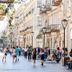 Sultan Inn Boutique Hotel, Baku: street view of ornate buildings and pedestrians on a lively boulevard