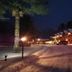 Nootka Lodge in Woodsville at night, with snow-covered driveway and warmly lit cabins