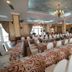 Sammy Dalat Hotel in Dalat ballroom with long banquet tables and white chairs