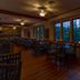 The Lodge on Lake Lure dining room with lake view windows in Lake Lure