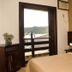 Maratea Mare in Florianopolis bedroom with balcony and mountain view