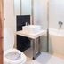 Hotel Dreamworld Araneta Cubao bathroom in Manila with toilet, sink, and bathtub