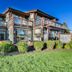 Newpark Resort in Park City exterior with balconies, large windows, and landscaped lawn