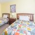 Villas at Seven Dwarfs Lane Resort, Kissimmee: twin guest room with two single beds and nightstand