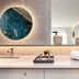 Sofitel Agadir Thalassa sea & spa bathroom vanity with round backlit mirror and tiled shower wall in Agadir