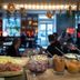 Reimersholme Hotel in Stockholm with a buffet table of sliced meats, cheese and condiments in a dining area.