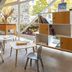 ibis Paris Tour Eiffel Cambronne 15ème lounge with children’s play area and large arched window in Paris