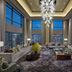 Mandarin Oriental, Kuala Lumpur lounge with floor-to-ceiling city views and modern seating