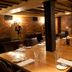 Hotel du Vin Brighton in Brighton dining room with long wooden table, leather chairs and brick walls