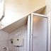 Alvares Cabral Guest House in Porto bathroom with toilet, shower enclosure and sloped ceiling