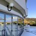 Park Hotel Mirabeau in Gasperina with terrace, glass doors, ocean view and outdoor seating