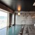 Hotel Route-Inn Tokuyama Ekimae indoor hot spring bath in Shunan with tiled pool and shower area