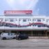 N9 Business Hotel in Kampung Baharu Nilai exterior with parked cars and blue sky