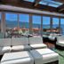 Avala Resort & Villas in Budva lounge with white sofas and panoramic sea and mountain views