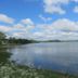 The Bay Horse Hotel And Restaurant in Ulverston with a calm lake view and cloudy sky