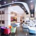 Grand Daira Hotel Palembang lobby lounge in Palembang with colorful chairs and modern seating