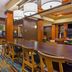 Fairfield Inn & Suites by Marriott Cookeville lobby with long communal table and colorful carpet