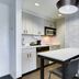Homewood Suites by Hilton Louisville-East kitchenette with island seating in Louisville