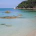 Silver Beach Resort, Ko Samui, beachfront tropical bay with clear shallow water and rocky outcrops