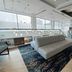 Fairfield Inn & Suites by Marriott New York Brooklyn lobby with modern seating, staircase and large windows