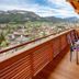 Romantik Aparthotel Sonnleitn balcony with mountain and village views in St. Johann in Tirol