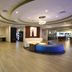 Holiday Inn Express & Suites Lakeland South lobby with seating area and circular sofa, Lakeland
