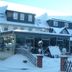 Berghotel Drei Brüder Höhe in Marienberg with snow-covered roof and courtyard