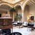 Hotel Cetina Palacio de los Salcedo in Baeza: elegant courtyard lounge with arches, seating, and a decorative gazebo