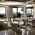 Park Hotel Mirabeau in Gasperina dining room with large windows overlooking the sea
