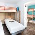 hotelF1 Annemasse in Saint-Cergues: twin bunk beds with orange rails and built-in wall lights