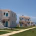 Kyparissia Blue Boutique Hotel in Kyparissía with seaside villas, lawn, and ocean view
