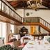 Quinta Nova Winery House - Relais & Châteaux dining room in Covas do Douro with staircase and fireplace