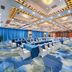 The Greenway Hotel Xiamen conference hall with banquet tables and blue drapes in Xiamen