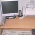 Bordine Guesthouse in Leeuwarden desk with computer, phone, lamp and keyboard