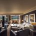 Soho Hotel & Casino at Sun City Resort suite with lounge, dining area and valley view