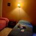 Hosteria Ailen in Ushuaia twin room with two single beds and wall lamp