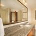 Drury Plaza Hotel St. Louis Chesterfield bathroom with granite vanity, large mirror and jetted tub