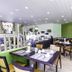 Hotel Engel im Salinental breakfast restaurant in Bad Kreuznach with set tables and green accent wall