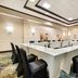 Hilton Garden Inn Dulles North in Ashburn meeting room with U-shaped conference table and black chairs