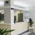 Hotel Bradomin front desk and lobby in Vilanova de Arousa with white decor and plants