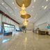 Xinji Garden Hotel in Nanchang lobby with chandeliers, polished marble floor and reception desk